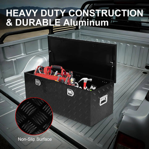 Beefy Heavy Duty Aluminum Truck Bed Tool Box 44 Inch Wide Diamond Plate Waterproof Storage Case in truck bed, open with tools