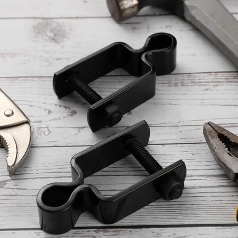 Heavy Duty Square Post Female Gate Hinges For Chain Link Fences Black Hot Dipped Galvanized Steel With Bolts on wooden surface.