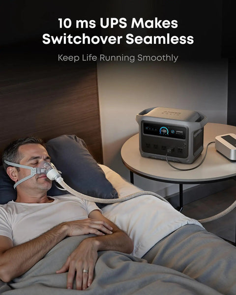 Man sleeping with UltraFast Portable Power Station With 1024Wh LiFePO4 Battery next to bed, powering medical device.