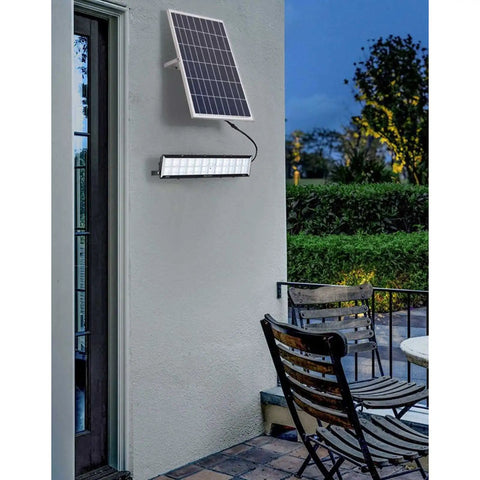 JUDYSSY Solar Powered Street Flood Lights Outdoor Led Waterproof Lamp with Remote Control mounted on a wall with solar panel.