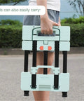 Heavy Duty Folding Hand Truck Dolly Cart With Six Wheels For Moving Luggage And Heavy Goods Durable Diamond Pattern Platform Easy Fold And Extend Compact When Stored Green, folded and carried by hand