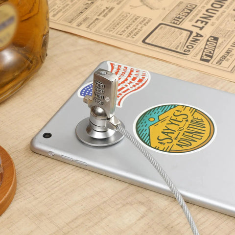 Heavy Duty Laptop Cable Lock With A Beefy Steel Core And Slick Combo Code attached to a tablet, ensuring security against theft.