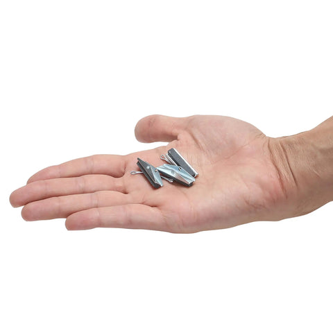 Hand holding brake cylinder hone replacement stone set 3 piece medium grit 1 1/8 inch for cleaning and polishing brake cylinders