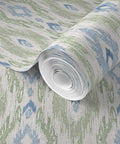 Straight Up Heavy Duty Ikat Stripes Wallpaper With Faux Pvc Free Matte Linen Texture rolled, showcasing green and blue stripes.