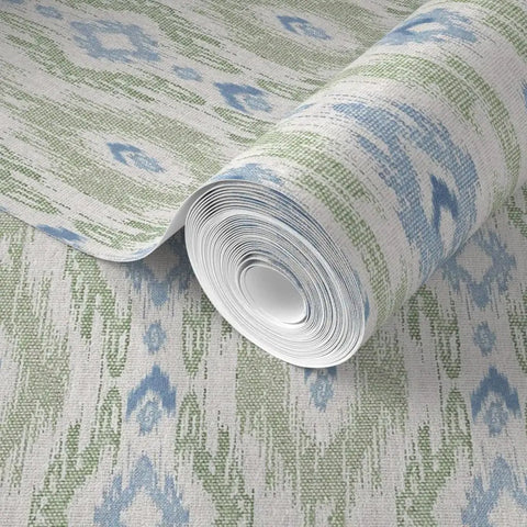 Straight Up Heavy Duty Ikat Stripes Wallpaper With Faux Pvc Free Matte Linen Texture rolled, showcasing green and blue stripes.