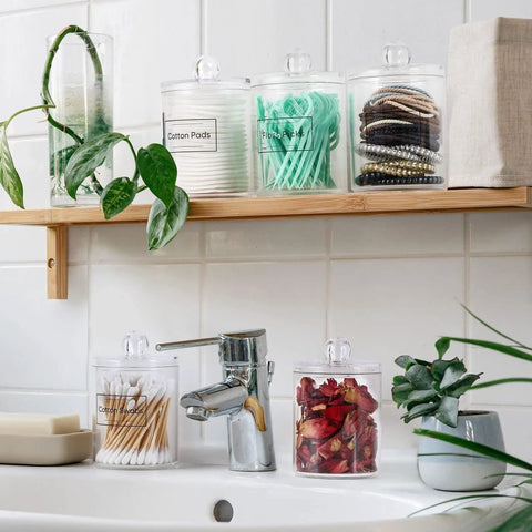 Super Practical Four Pack Clear Acrylic Qtip Holder Dispensers With Lids For Organizing Cotton Swabs Balls Pads And Floss Picks Comes With Labels In Two Sizes Twelve Ounce And Ten Ounce