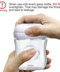 Close-up of hands tightening No Drama Replacement Screw Ring Collar For Natural Baby Bottles Flawless Fit PP Or Glass Quick Change BPA Free Top Shelf Nursery Gear Four Pack.