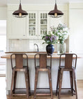 Barn Style Pendant Light With Rustic Rust Finish, Industrial Wire Cage Hanging Fixture For Kitchen Island And Hallway in modern kitchen.