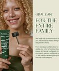 Toothpaste tube squeezer with metal roller; front view of a woman holding a green mint toothpaste tube.