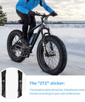 Cyclist on snow with bike featuring Front Fork For Four Inch Fat Tires With 130mm Travel And Crown Lockout, 135mm Hub, 9mm QR