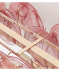 Close-up view of Luxury Colorful Glass Led Pendant Lights French Modern Hanging Lamp showcasing vivid pink glass and gold accents.