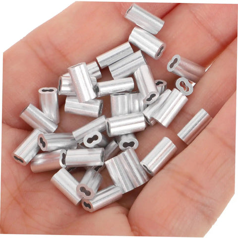 Kick Ass Heavy Duty Aluminum Cable Sleeves, Eight Shaped Snare Wire Ferrules for USB C Charger Ends, hand holding silver ferrules.