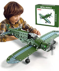 Child assembling Hands-On DIY Model Airplane Kit With 285 Metal Parts, Fighter Jet STEM Building Project, box in background