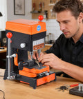 Man using Pro Grade 120W Cutter And Manual Duplicator Copy Machine With Vertical Copy Drill Copper Core Adjustable Motor for key cutting