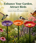 Handmade Ceramic Mini Pollinator Watering Station For Outdoor Gardens with colorful flowers and birds in a garden setting.
