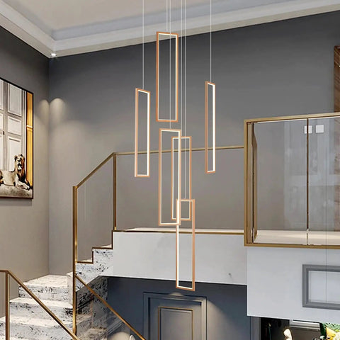 Contemporary staircase with elegant LED pendant lights suspended in a stylish arrangement above modern decor.
