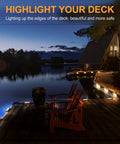 Nighttime view of a deck by a lake illuminated with Six LED Solar Fence Lights Outdoor Waterproof Path Lighting For Decks IP65