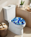 Elongated Blue Stained Glass Effect Abstract Mosaic Flowing Toilet Seat on a white toilet in a modern bathroom setting.