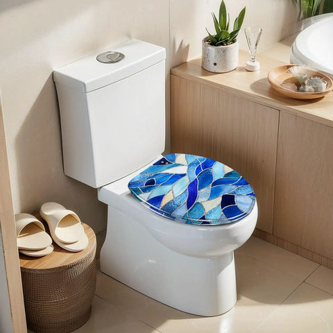 Elongated Blue Stained Glass Effect Abstract Mosaic Flowing Toilet Seat on a white toilet in a modern bathroom setting.