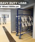 6 inch heavy duty caster wheels on blue cart in industrial setting, 1000 lbs capacity per wheel, Heavy Duty 6 Inch By 2 Inch Rubber Tread Caster Wheels Set Of 4 With 1/2 Inch Bore For Carts And Hotels Quiet Indoor Use 3/4 Inch Roller Bearing Load Up To 600 Lbs Per Wheel Ideal For Quiet Indoor Mobility On Carts Reducing Noise And Vibration.