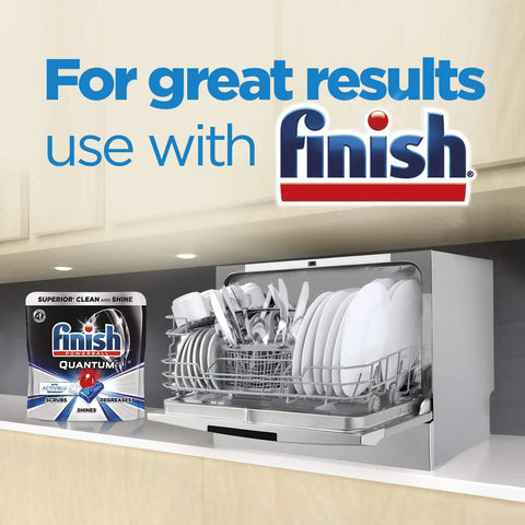 Total Game Changer Compact Countertop Dishwasher In Brushed Stainless Steel with dishes and Finish detergent in kitchen.