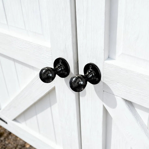 Close-up of Built Tough Heavy Duty Matte Black Barn Door Pull Handle Solid Zinc Alloy Ring Knob on wooden double doors.