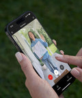 Image of a user viewing a delivery person through the Badass Wired Doorbell Camera With 2K Video And Slick Nickel Silver Finish.