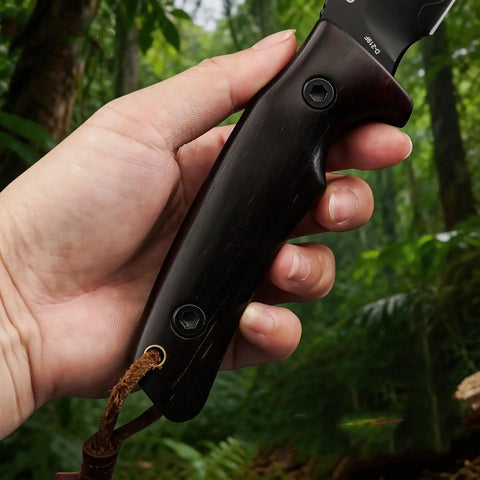 Hand holding Fixed Blade Knife With Rosewood Handle And Leather Sheath For Outdoor Use VG10 Steel Blade 3.74 Inch Cutting Edge 230mm Overall Ergonomic Grip Ideal Camping Hiking And Bushcraft Tool Beast