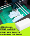 Two Pack HDPE Plastic Blocks in a cutting machine, showing fabrication process for milling, engineering, crafting, and DIY projects.