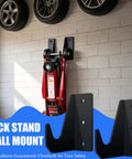 2 Pack Wall Mount Jack Stands Organizer For Floor Jacks Universal Car Jack Holder mounted on a garage wall with wheels above.