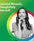 Woman smiling in front of colorful background with text 'Essential Minerals, Thoughtfully Sourced.'