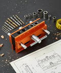 Vertical Hole Opener Dowel Jig Drill Guide Clamp Alloy Body Extended Model with drill bits and tools on a work surface.