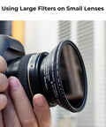 Close-up of camera lens with 9 Piece Step Up Ring Set And 9 Piece Step Down Ring Set Camera Lens Filter Adapter Kit attached.