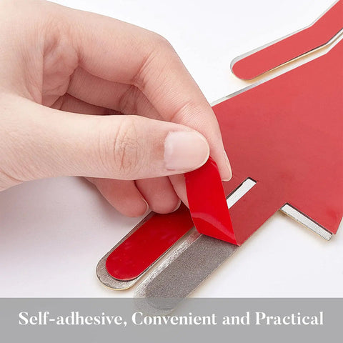 Close-up of red self-adhesive backing on brushed gold restroom signs for men and women set with durable plastic ABS.