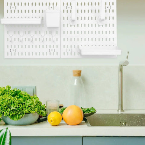 Medium Size Nail Free Wall Pegboard Organizer With Heavy Duty Hooks And Solid Wood Panel To Kick Clutter To The Curb While Freeing Up Space In Kitchen Bedroom Or Craft Room For Quick Everyday Organization on wall over a kitchen counter with fresh produce.