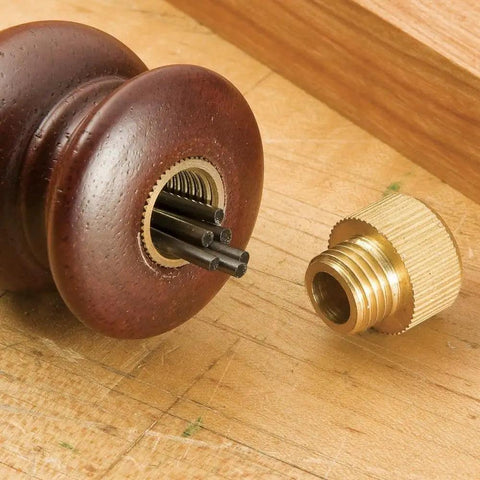 Heavy Duty Adjustable Trammel Points Set With Smooth Hardwood Handles And Precision Pencil Leads For Knockout Circle Layouts And No Hassle Arc Marking That Fits Dead Square On Shop Beams showing brass clamp and pencil leads.