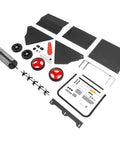 Four Wheel Spreader And Garden Cart parts laid out including assembly tools, wheels, and metal frame for lawn fertilizer spreader.