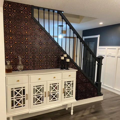 Upgrade Your Ceiling Fast With 2x2 Ft Wrought Iron PVC Tile Glue Up Panels Class A Fire Rated Lightweight Decorative Ceiling And Wall Tiles Antique Silver 10 Pack Covers 40 Sq Ft Ideal DIY Reno wall installation in hallway.
