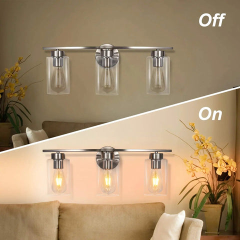 Three Light Brushed Nickel Luxe Bathroom Vanity Wall Sconce With Curved Modern Design And Clear Glass Shades shown Off and On