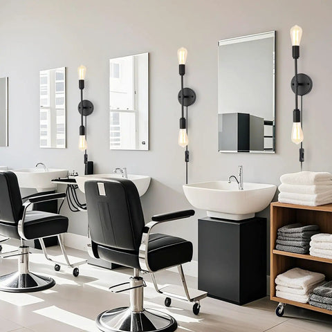Lit Two-Light Black Bathroom Vanity Light Fixtures Set Of Two, Modern Industrial Wall Sconces displayed in a salon setting