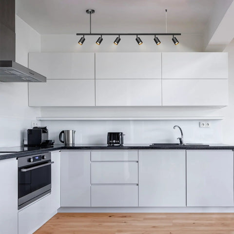 Globe Electric 64000123 55" 6-Light Adjustable Height Track Light, Matte Black, installed in a modern kitchen ceiling, pivoting heads