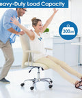 Person enjoying smooth ride on heavy duty office chair caster wheels with 300 lbs load capacity for safe and easy movement on floors.