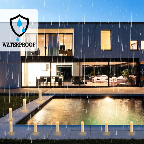 Lit 12 Pack Flameless LED Candles Battery Operated Waterproof Pillars With 2 Remote Controls arranged outdoors by pool