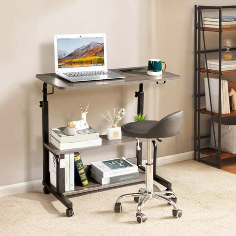 Hella Sturdy Adjustable Standing Desk On Smooth Lockable Wheels, Super Slick Rolling Laptop Station With Storage Shelves, Easy Setup Grey Oak Home Office Daily Driver with laptop and storage.