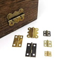 Twelve Pack Mini Heavy Duty Cabinet Door Hinges With Screws Golden Finish 5x19mm Durable Mounting Hardware For Kitchen Cabinets Pantry Doors And DIY Projects on wood box