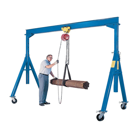 Heavy Duty Adjustable Height Gantry Crane 6000 Lb Capacity 15 X 10 Ft Steel Frame Built Tough lifting pipes with a worker.