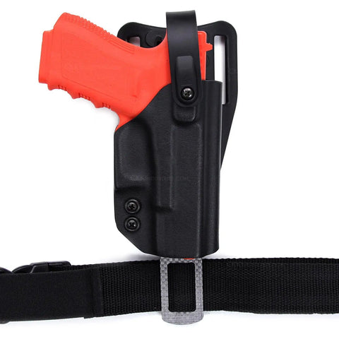 Black holster made from 12x12 Inch Coyote Brown Thermoplastic Composite Sheet, 12 Layers At.060 Thick, attached to a belt with an orange training gun inside.