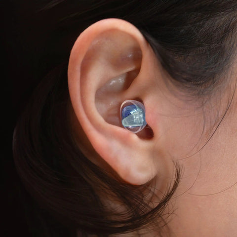 Smaller Ears Earplugs for Concerts and Festivals shown in ear for high fidelity noise reduction, reusable for small ear canals