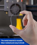 Hand holding a stainless needle from Essential 50 Piece 3D Printer Nozzle Cleaning Kit With 0.2mm 0.25mm 0.3mm 0.35mm 0.4mm Stainless Needles For Quick Clean Prints Easy Maintenance And Smoother Extrusion