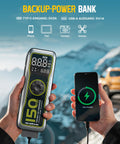 Portable Tire Inflator With 16000mAh Battery 150 PSI Air Pump Delivers 35 Liters Per Minute For Cars, Motorcycles, Bikes And Sports Balls Auto Shut Off Large LED Display Built In LED Light 12V DC shown next to charging phone with car in the background.